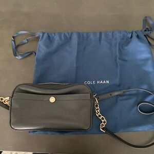 Cole Haan black leather cross body purse with card holders in dust bag